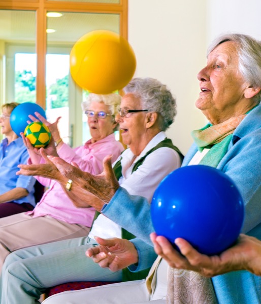 Seniors participating in physical and mental stimulation activities at Vital Senior Center