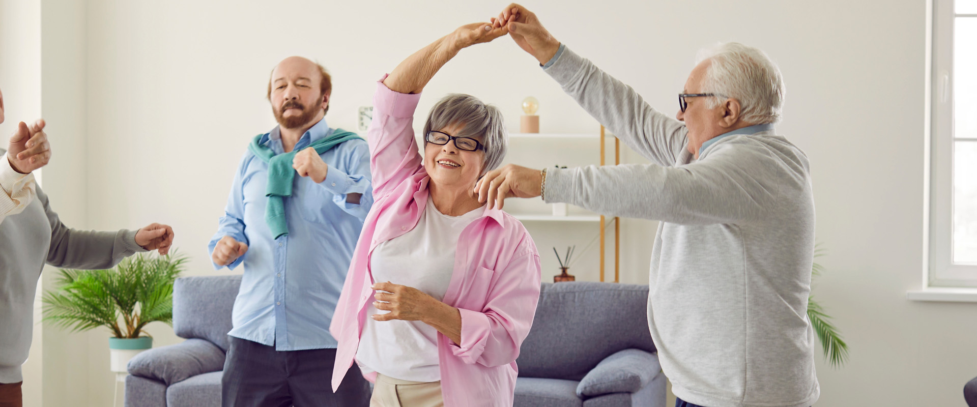 Seniors dancing and enjoying time together at Vital Senior Center